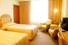 Grand Tower Inn - Unit Bedroom