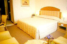 Grand Tower Inn - Unit Bedroom