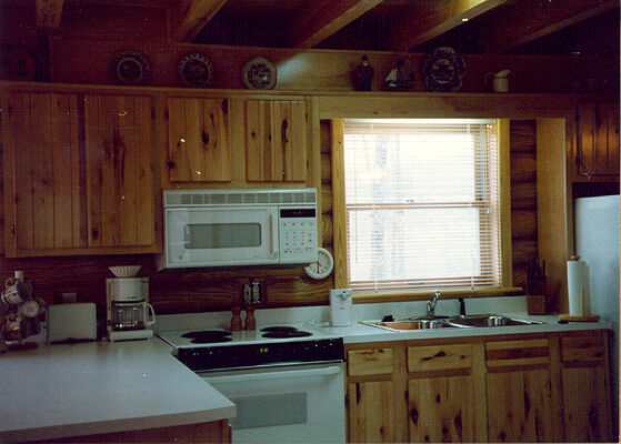 Kitchen in a two bedroom log cabin