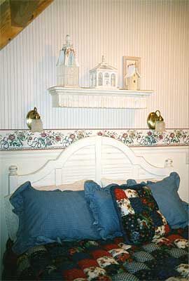 Second bedroom in a two bedroom log cabin