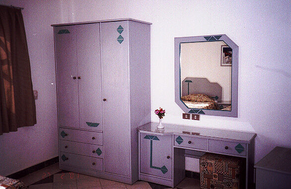 Dive Inn Resort - Bedroom of a unit